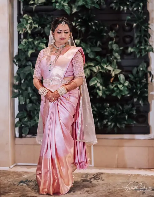 A dancer bride in a pink silk saree, photographed by Glad Clicks Photography